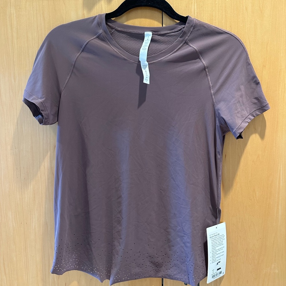 Lululemon Active Top with open air back.